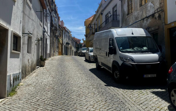 Square image of a white van
